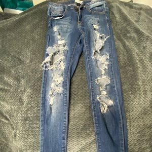 Distressed Dark Denim Jeans